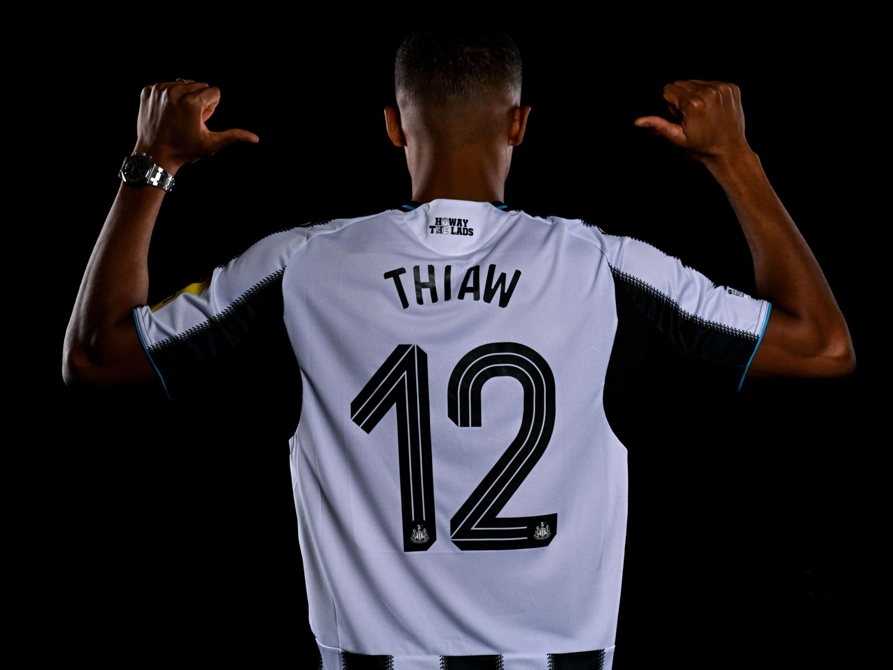 NEWCASTLE UPON TYNE, ENGLAND - AUGUST 12: Malick Thiaw poses for photographs after signing for Newcastle United at the Newcastle United Training Centre and Caviar Studios on August 12, 2025 in Newcastle upon Tyne, England. (Photo by Serena Taylor/Newcastle United via Getty Images)